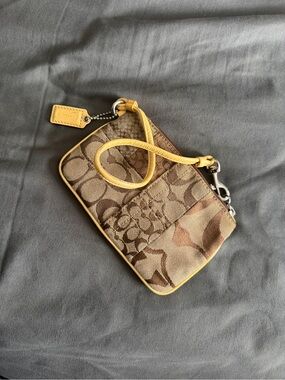 Coach Brown Signature Patchwork Wristlet with Yellow Trim